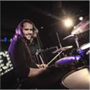 International touring drummer with 20 years teaching experience