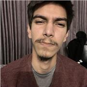 Music teacher providing guitar, piano lesson to all