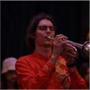 Trumpet coach helping beginners and intermediates improvise confidently