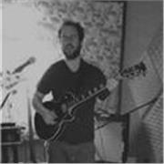 Profesor de guitarra con 25 años de experiencia brinda clases online de guitarra