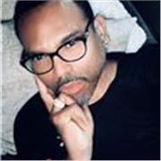 An American passionately and patiently teaching French students English. 