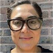 Friendly English tutor helping young learners build confidence.