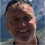 Calm, experienced mentor helping people grow with confidence.