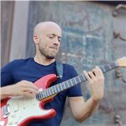 Professional guitarist & degree-qualified music teacher with international experience in various genres including Rock, Soul, Funk