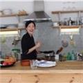 Profesora y cocinera coreana con experiencias de dar clases de comida coreana en espanol.