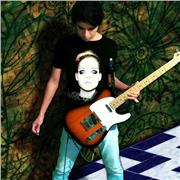 Maestro de Música con especialidad en guitarra clásica y eléctrica