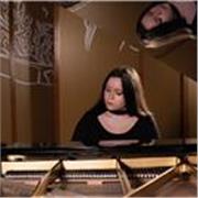 Profesora de lenguaje musical, piano, composición y diversas asignaturas musicales
