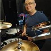 Qualified music tutor available to teach adults and children