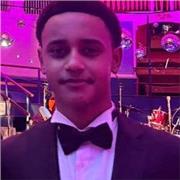 Law student teaching students of all ages