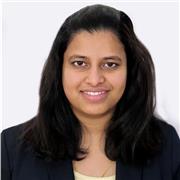 Biology teacher conducting classes in English for all grade levels