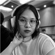 Critically-minded, warm English tutor from Indonesia offering online lessons for students and professionals with practical goals.
