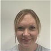 English tutor providing lessons to children of primary school age
