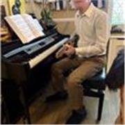 Piano and guitar teacher for all ages and musical styles