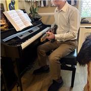 Piano and guitar teacher for all ages and musical styles