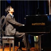 Piano tutor teaching music to students of all ages