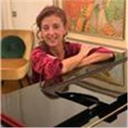 Pianista concertista impartisce lezioni di pianoforte a tutti i livelli es età , preparazione ad esami in Conservatorio