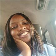 Patient, articulate tutor supporting school-age English learners