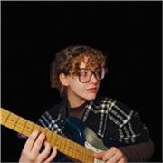 Guitar and Music Theory lessons online and in person:  eye-to-eye  level lessons for popular music, jazz, blues and more.