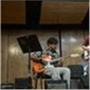 Maestro de música aplicada (teoría y guitarra)