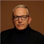 I am a native English speaker from the USA with many years of teaching experience as a professor in universities in Europe/Asia.