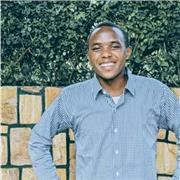 An experienced physics teacher delivering instructional lessons to students at the introductory level of physics