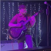 Guitar/Ukulele for beginners of all ages fun professional!