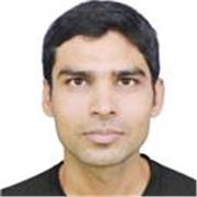 Computer teacher providing lessons to all children