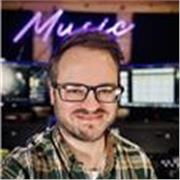 I’m an experienced guitar tutor with a 100% pass rate for hundreds of guitar exams.