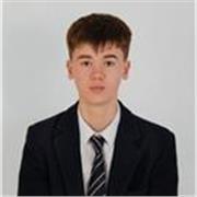 Maths tutor providing help to young people of a primary school age