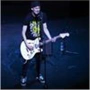 I give private music lessons to people new to the subject including guitar and piano alongside music theory.