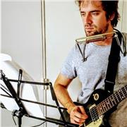 Profesor de Guitarra y/o Armónica (Principiantes o avanzados)