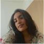 A native English teacher, who teaches in a way that makes the language applicable in daily life