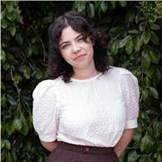 Cheery young professional excited to give tutoring lessons in writing - narrative writing, essay writing, and/or screenwriting