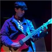 Maestro de guitarra acústica y eléctrica