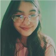 Spanish Tutor providing lesson to children of all years