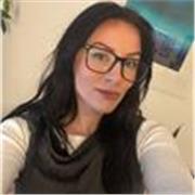 Supportive coach helping students build confidence and achieve progress.