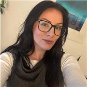 Supportive coach helping students build confidence and achieve progress.