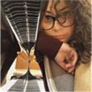 Laureata in Pianoforte e diplomata in sistemi informativi aziendali