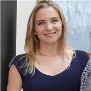 Confident, empathetic coach supporting student wellbeing and growth