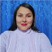 Profesora de apoyó, manejo de lápiz y renglón, escritura, identificación de letras, escritura de palabras