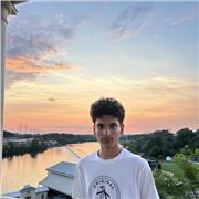 Young tutor teaching students from year 7 up until GCSE and A level