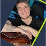 Musicista insegnante (10 anni di professione) impartisce lezioni di chitarra ONLINE o IN STUDIO - qualsiasi età e livello