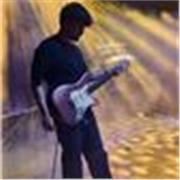 Laureato in conservatorio e specializzato in chitarra classica ed elettrica, attualmente turnista per vari artisti italiani