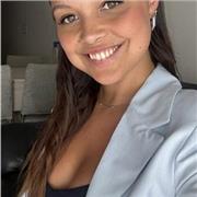 Friendly Spanish tutor helping students learn through personalized online lessons.