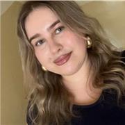 I’d describe myself as a patient, supportive, and enthusiastic teacher who focuses on building students’ confidence in English.