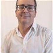 Profesor universitario de Derecho Constitucional y Derecho Administrativo en la Facultad de Ciencias Económicas, Rosario. Arg.