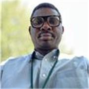 A professional who can teach GCSE Biology effectively.