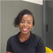 Confident, patient, creative teacher guiding curious young learners.