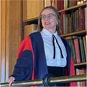 Supportive mentor helping students build confidence and focus.