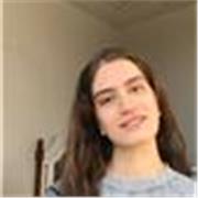 Passionate Spanish tutor helping adults students communicate confidently.